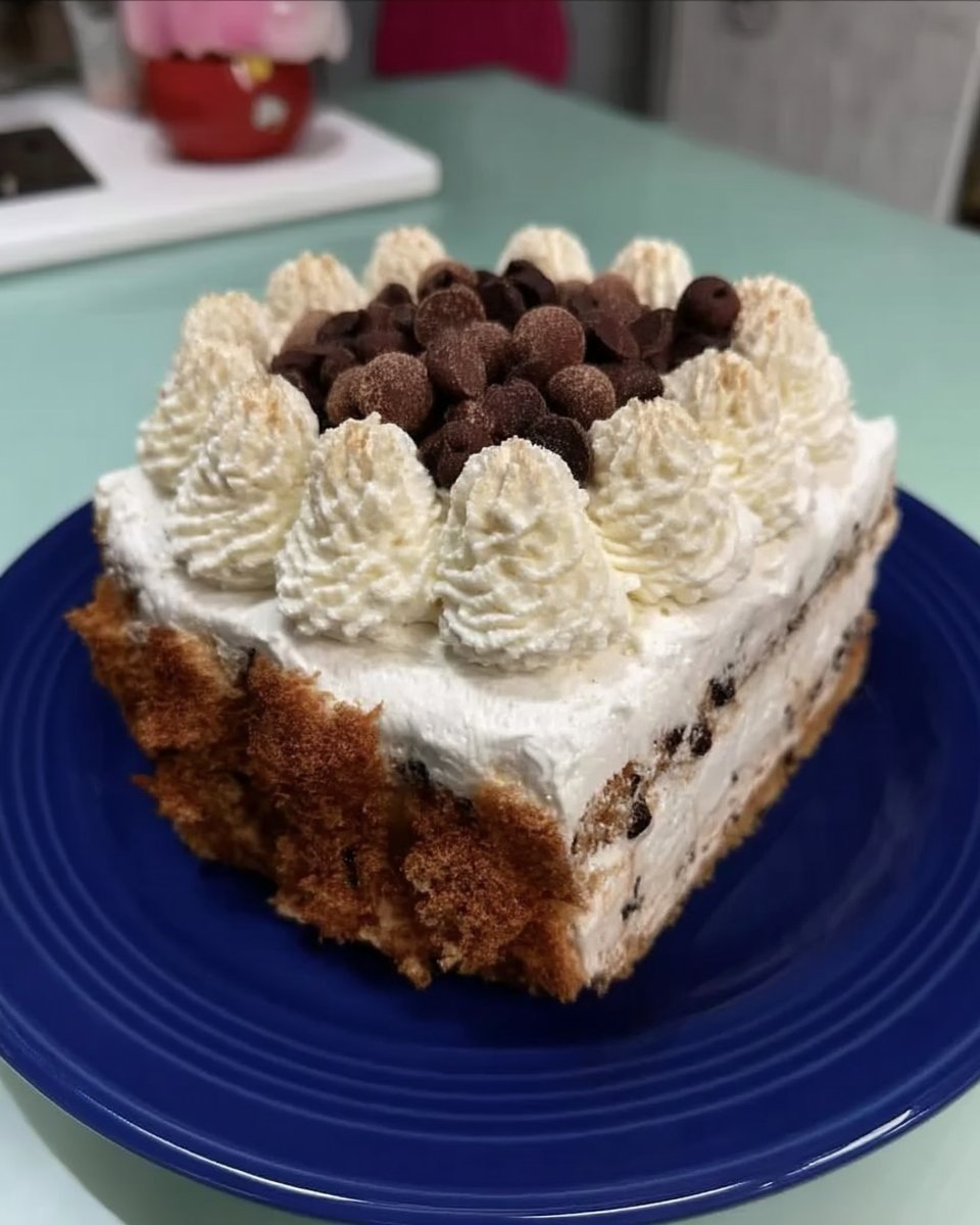 Whole chocolate layer cake served on a platter with turkish coffee