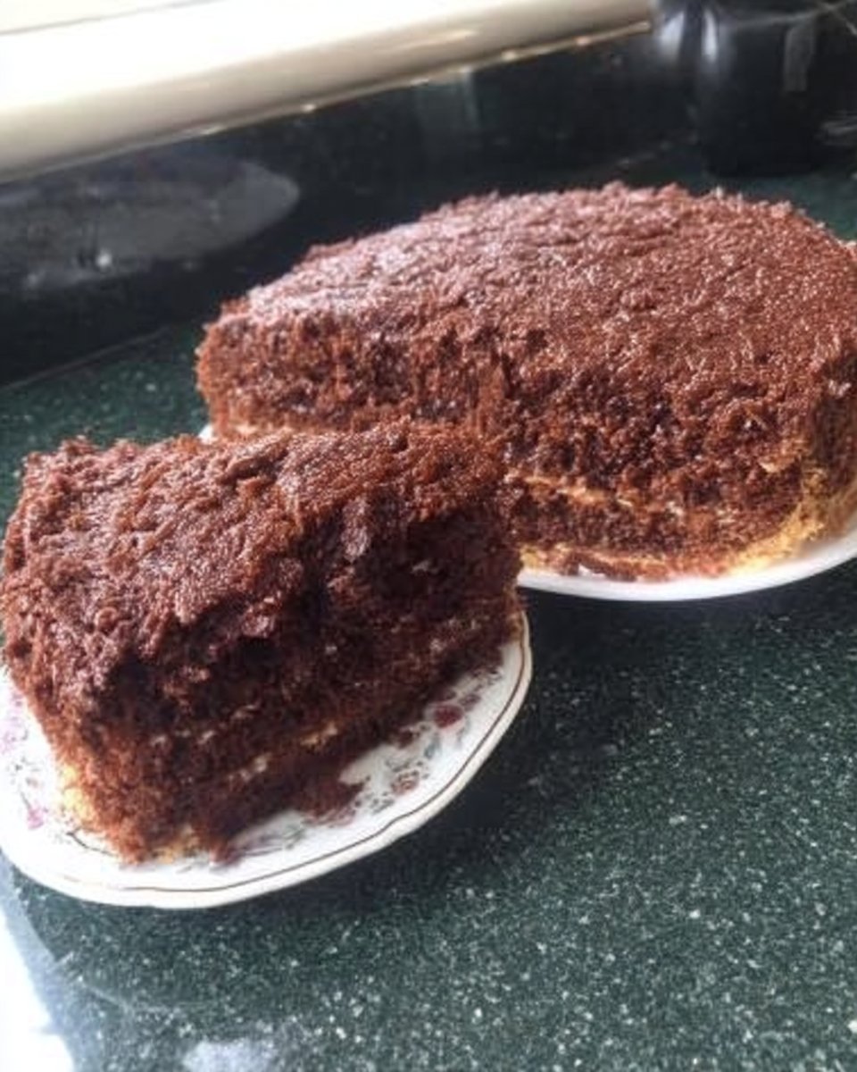 Ingredients for chocolate sponge cake including cocoa and eggs