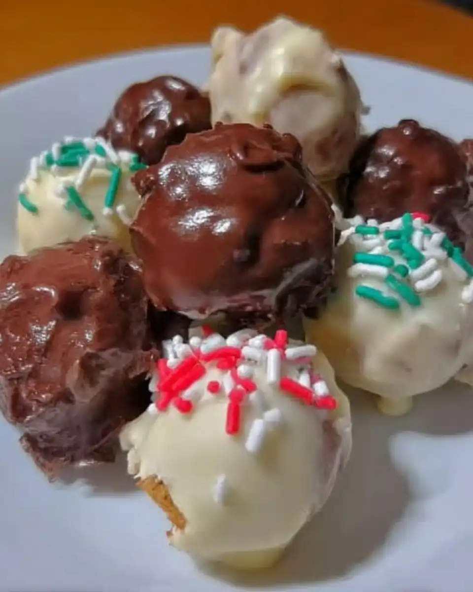 Cake Balls 13 Dipping frozen cake balls into melted white chocolate