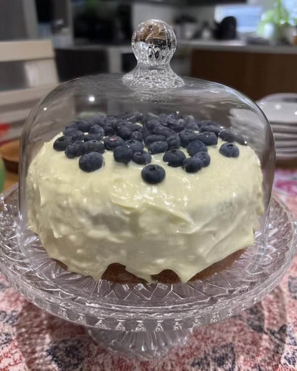 Whole lemon blueberry cake served with Turkish coffee