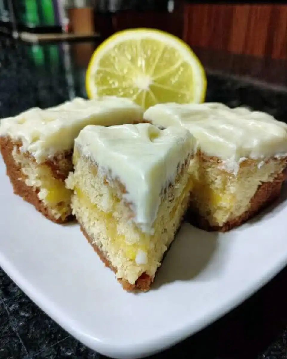 Ingredients for lemon cake including fresh lemons butter and flour