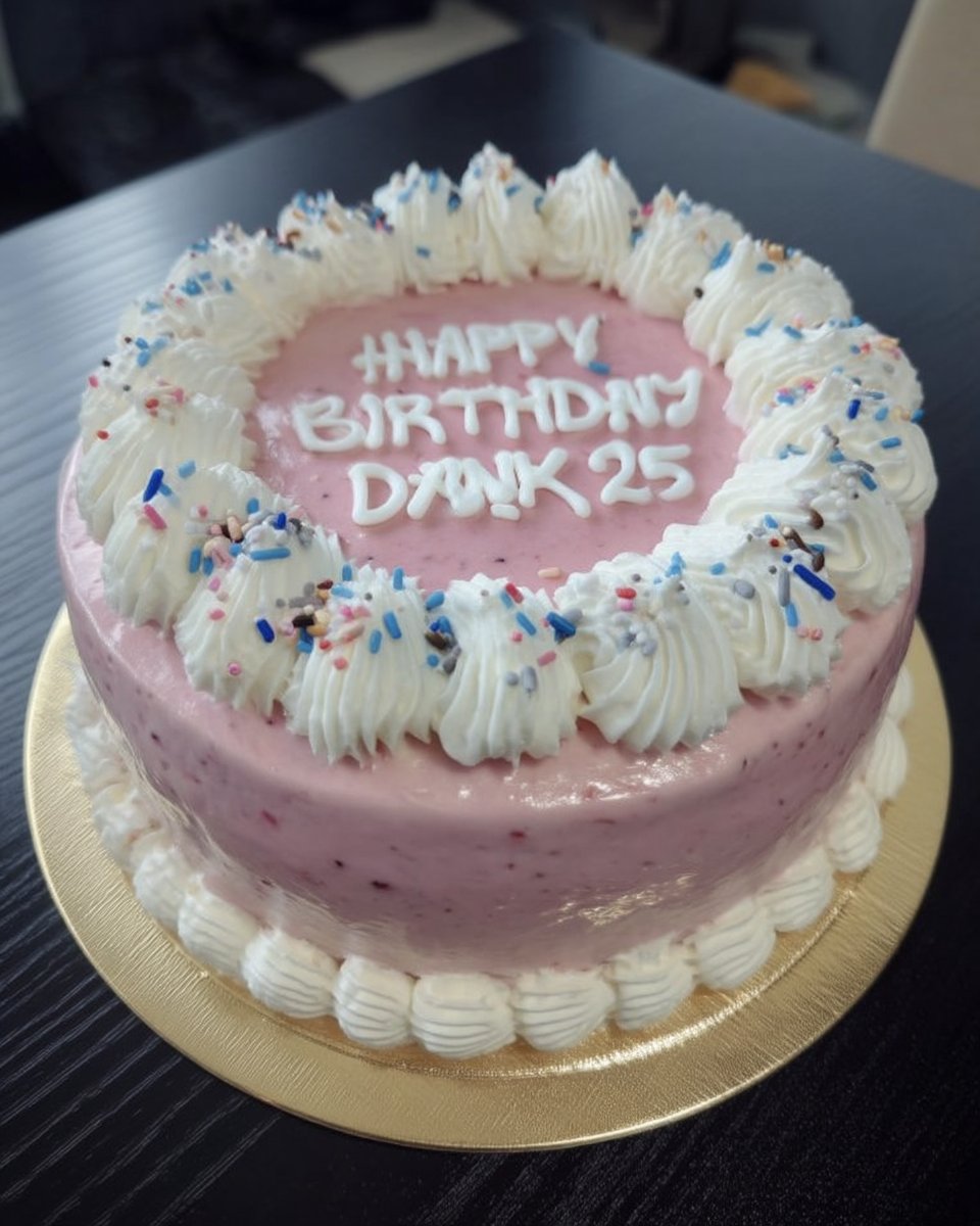 Frosted minimal cake with rainbow sprinkles