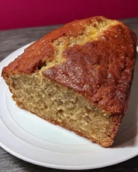 Close up of moist banana cake slice showing tender crumb texture