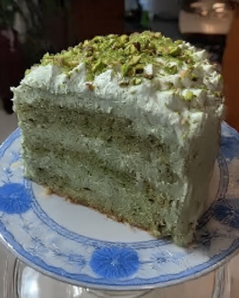 Watergate Cake 14 Square of watergate cake served on a vintage floral plate with a fork