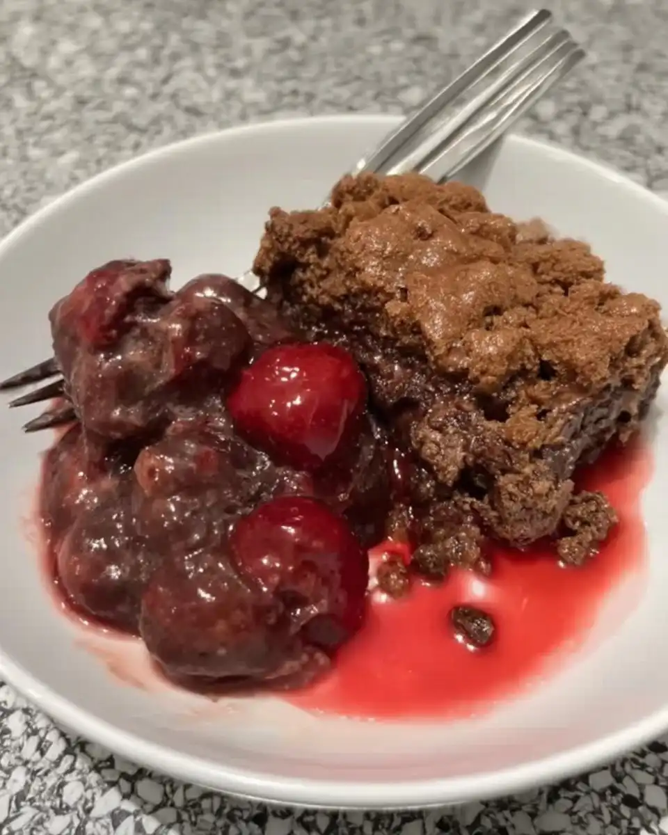 Chocolate Cherry Dump Cake 13 Sliced butter layered over dry chocolate cake mix in pan