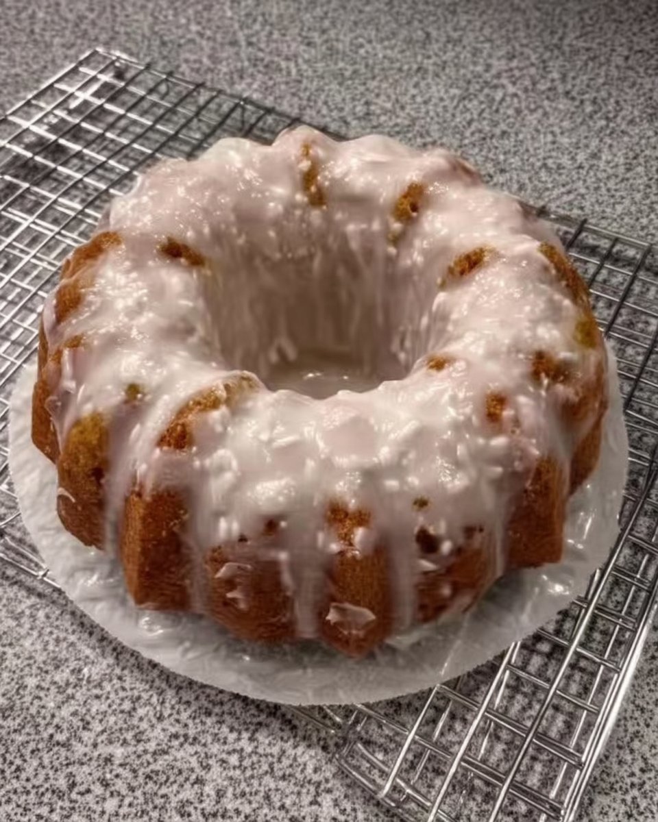 Slice of moist lemon pound cake on a plate