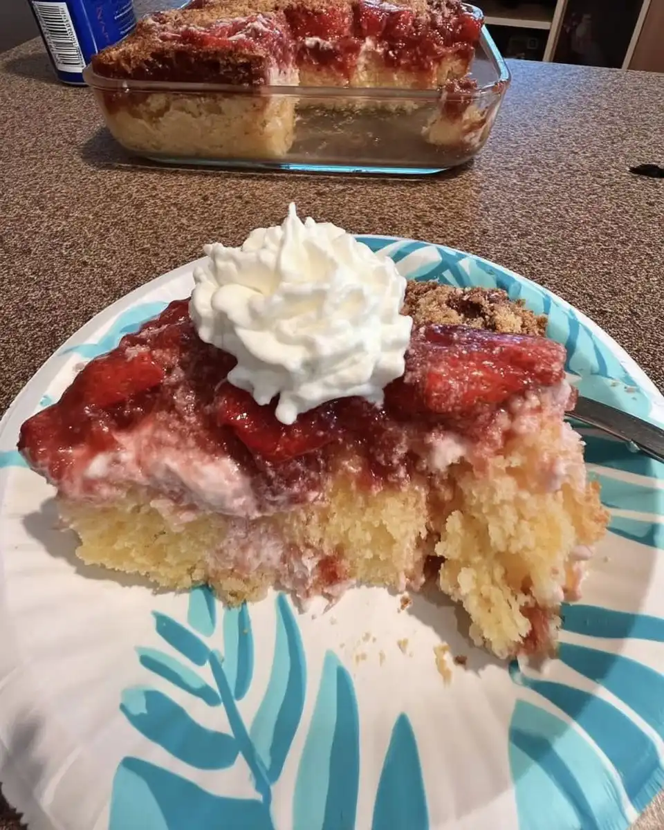 Slice of strawberry cake served with afternoon coffee