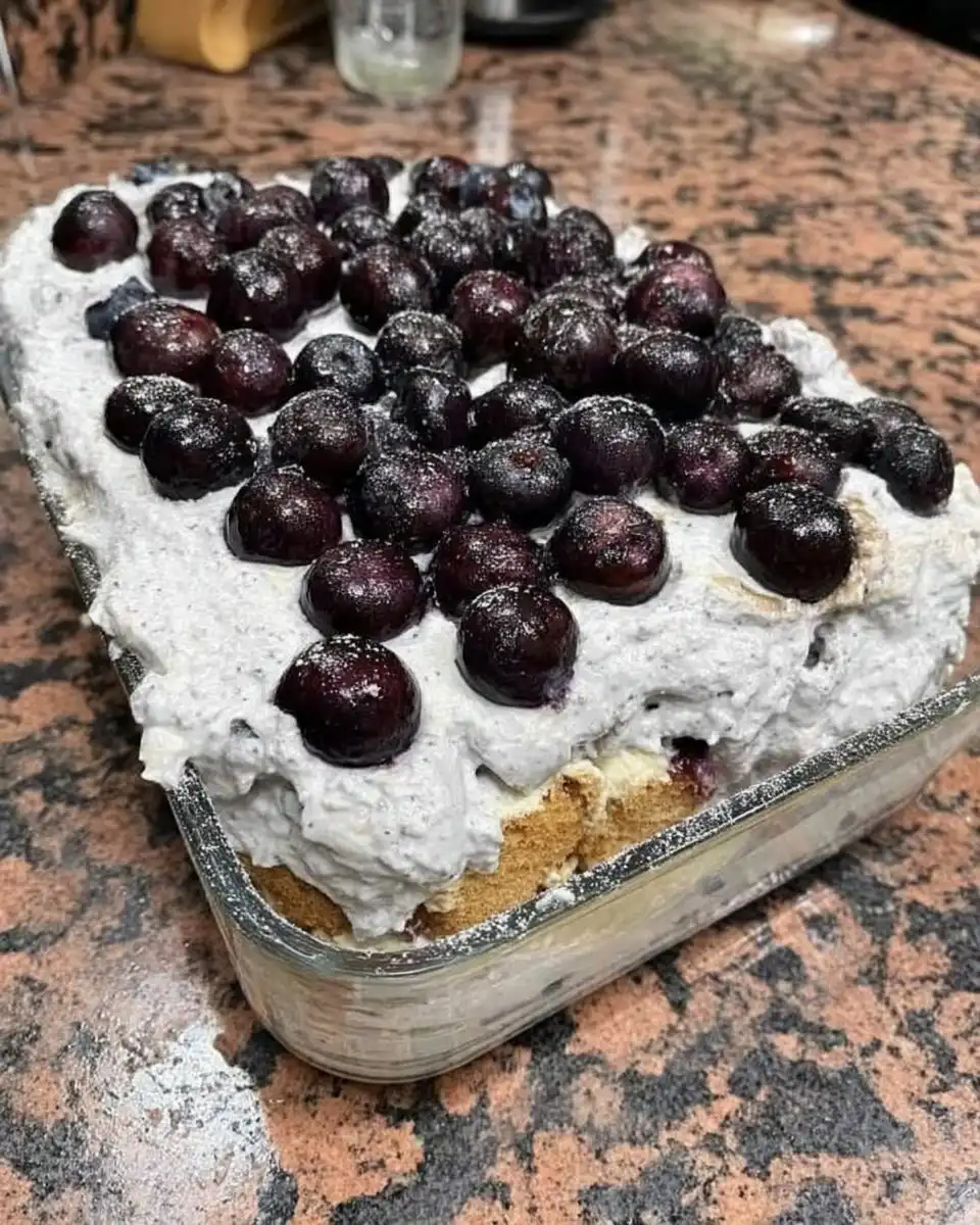 Strawberry Icebox Cake 10 Slice of strawberry icebox cake showing layers of chocolate pudding cream and crackers