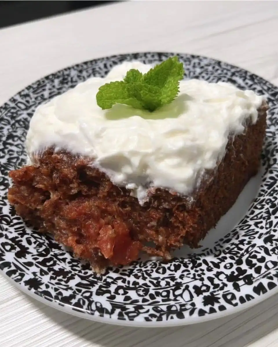 Tomato Soup Cake 10 Slice of tomato soup cake showing moist spice crumb and cream cheese frosting