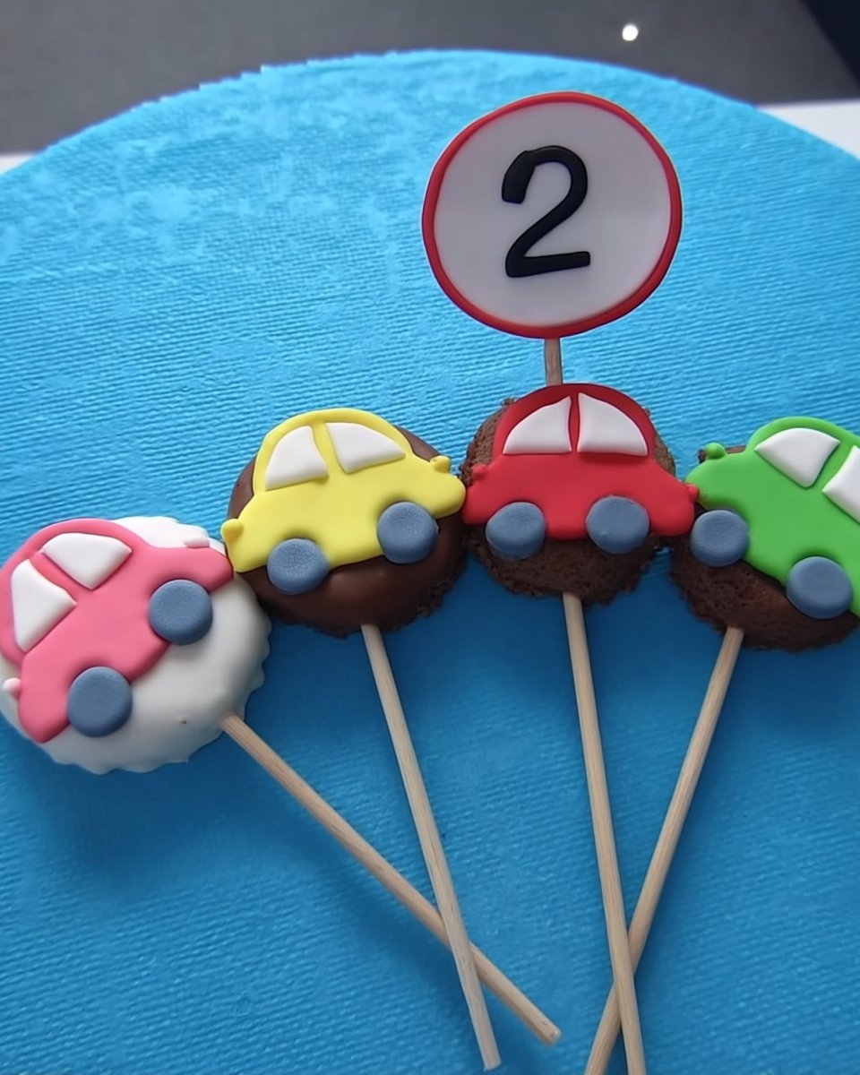 Ingredients for boy cake including vanilla layers and fondant tools