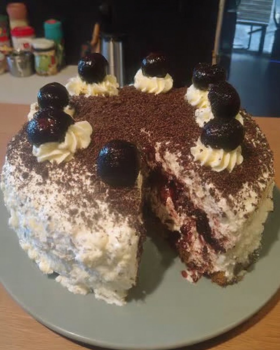 Whipping the milk chocolate mascarpone ganache to soft peaks