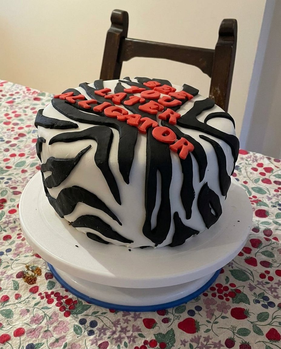 Two round golden yellow cake layers resting on a wire cooling rack