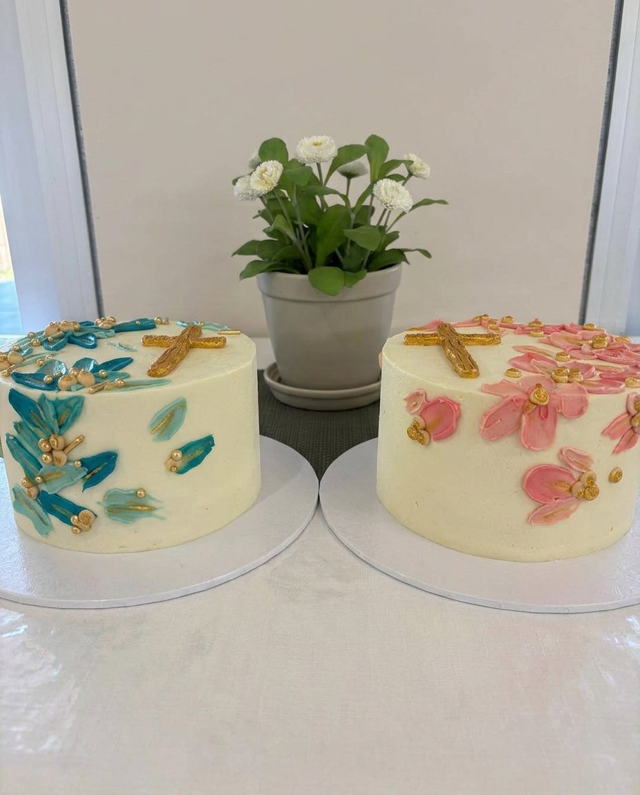 Baptism Cake 14 A fully decorated white baptism cake with buttercream stars and white flowers