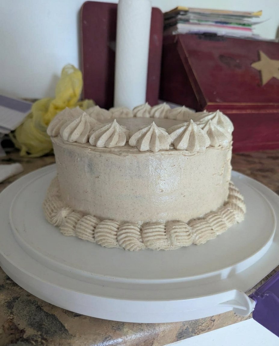 A cleanly sliced piece of cake for boyfriend with chocolate shavings