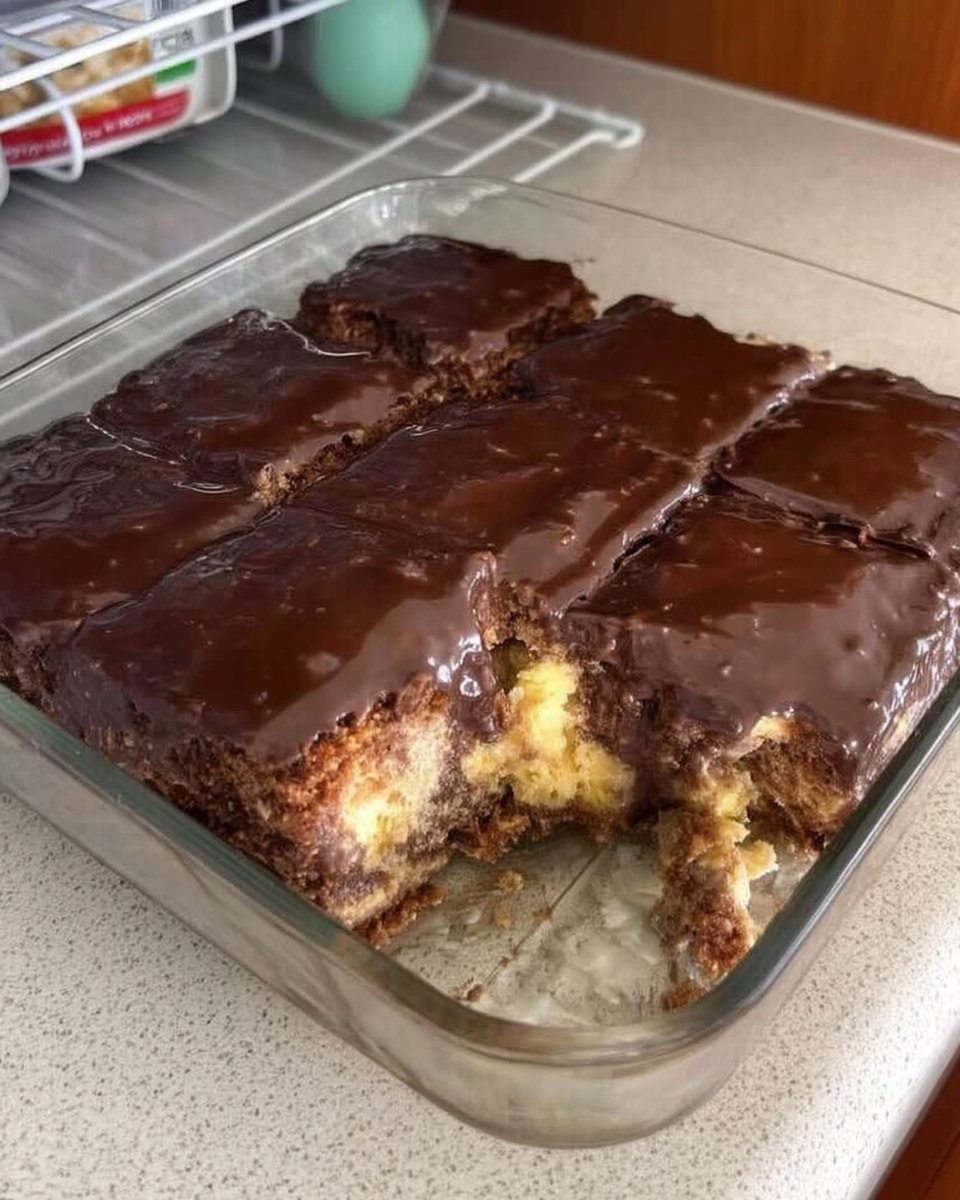 Slices of chocolate eclair cake showing the soft graham cracker and pudding layers
