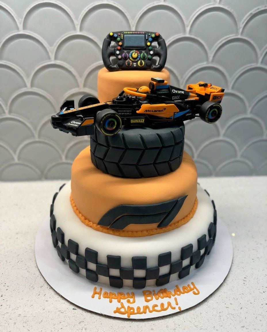A decorated F1 race car cake made from golden butter cake mix with apricot icing