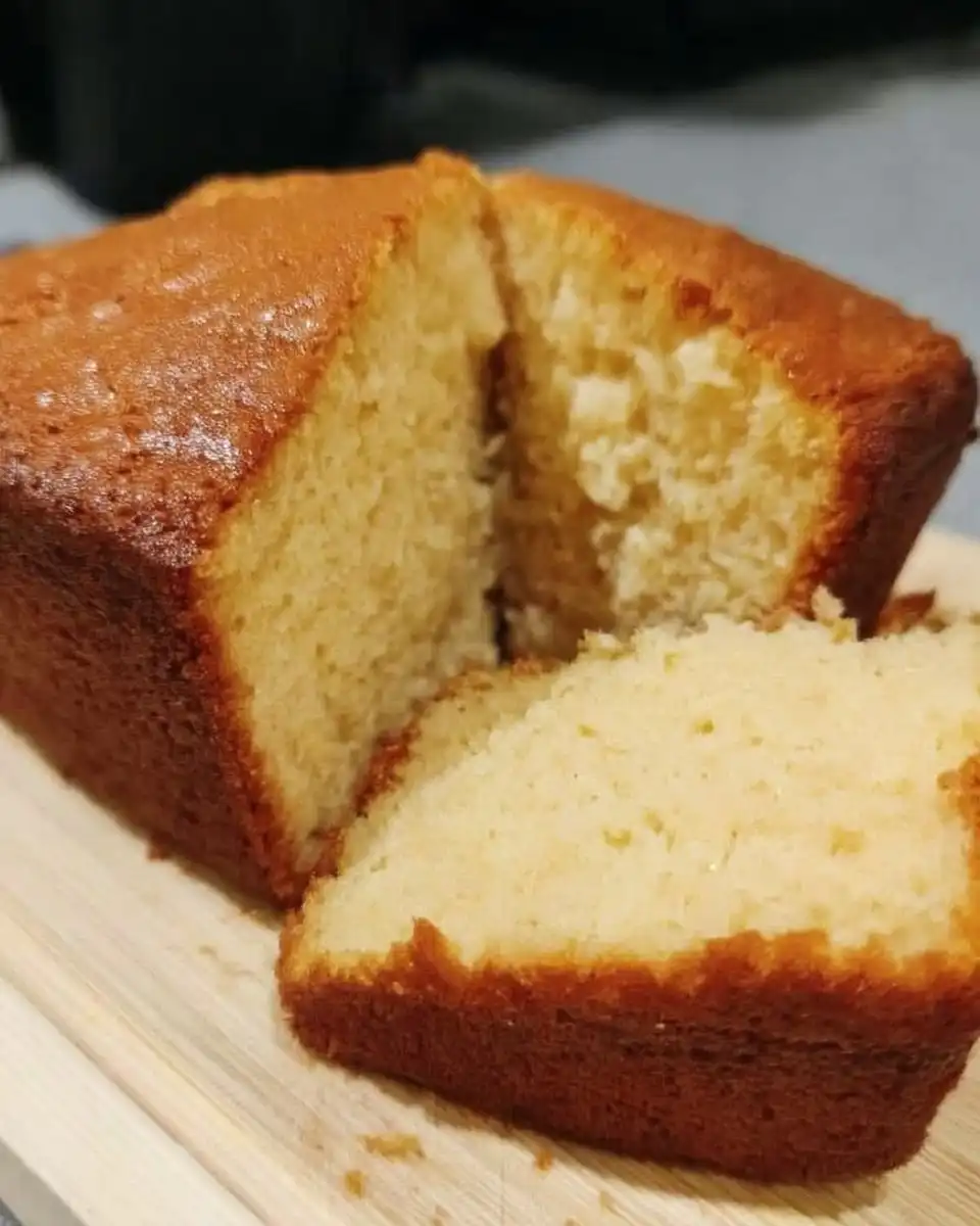 Lemon Yogurt Cake 2 12 Bright yellow lemons next to a bowl of thick creamy plain yogurt