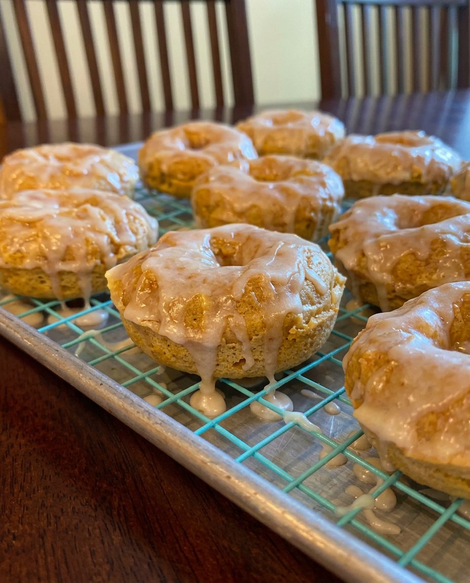 Donut Cake 14 The full chocolate donut cake on a white ceramic platter ready for serving.