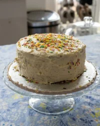 A two-layer Cake For Birthday with rich chocolate frosting and a fine crumb structure.