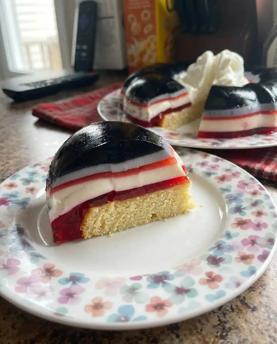 Ingredients for jello cake including red gelatin powder, strawberries, and condensed milk