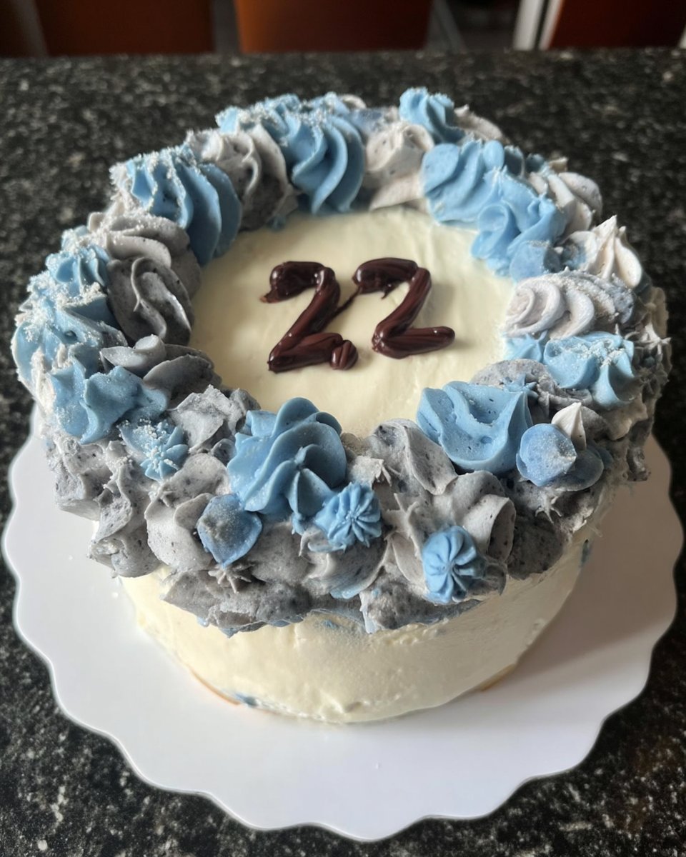 Ombre Cake 14 A slice of ombre cake on a white plate with fresh blueberries and coffee