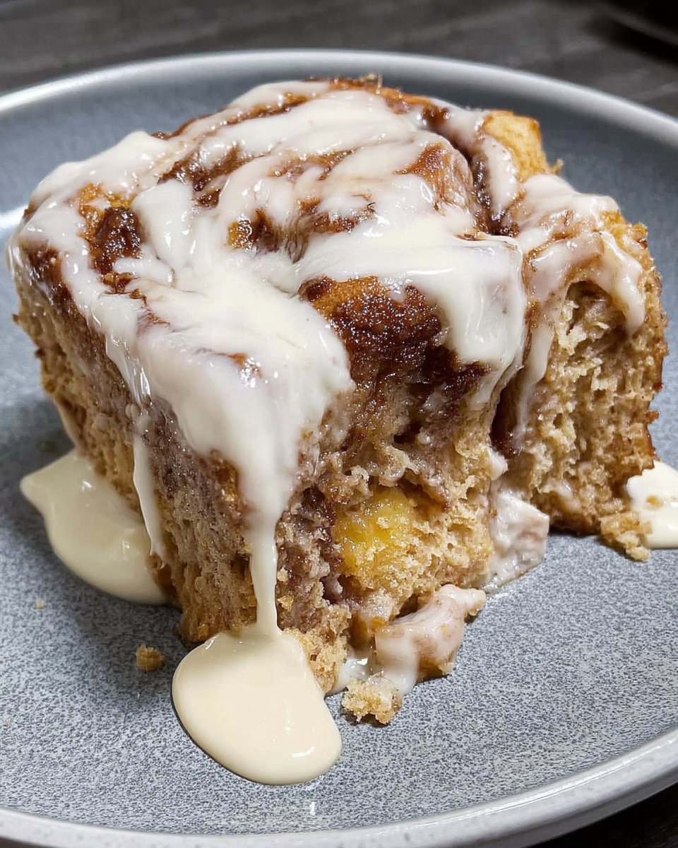 Cinnamoroll Cake 14 A clean slice of Cinnamoroll Cake on a white plate.