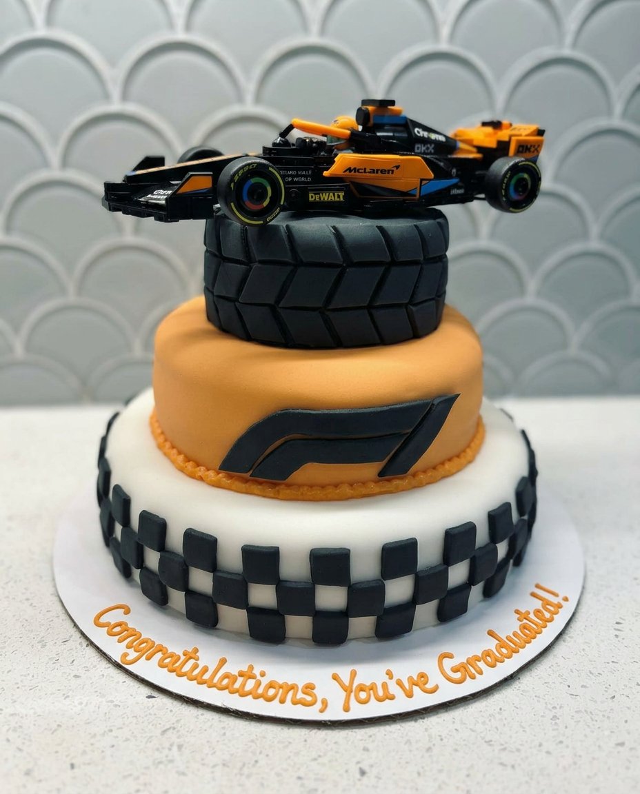 F1 Cake 14 A slice of F1 cake served on a plate with chocolate sprinkles