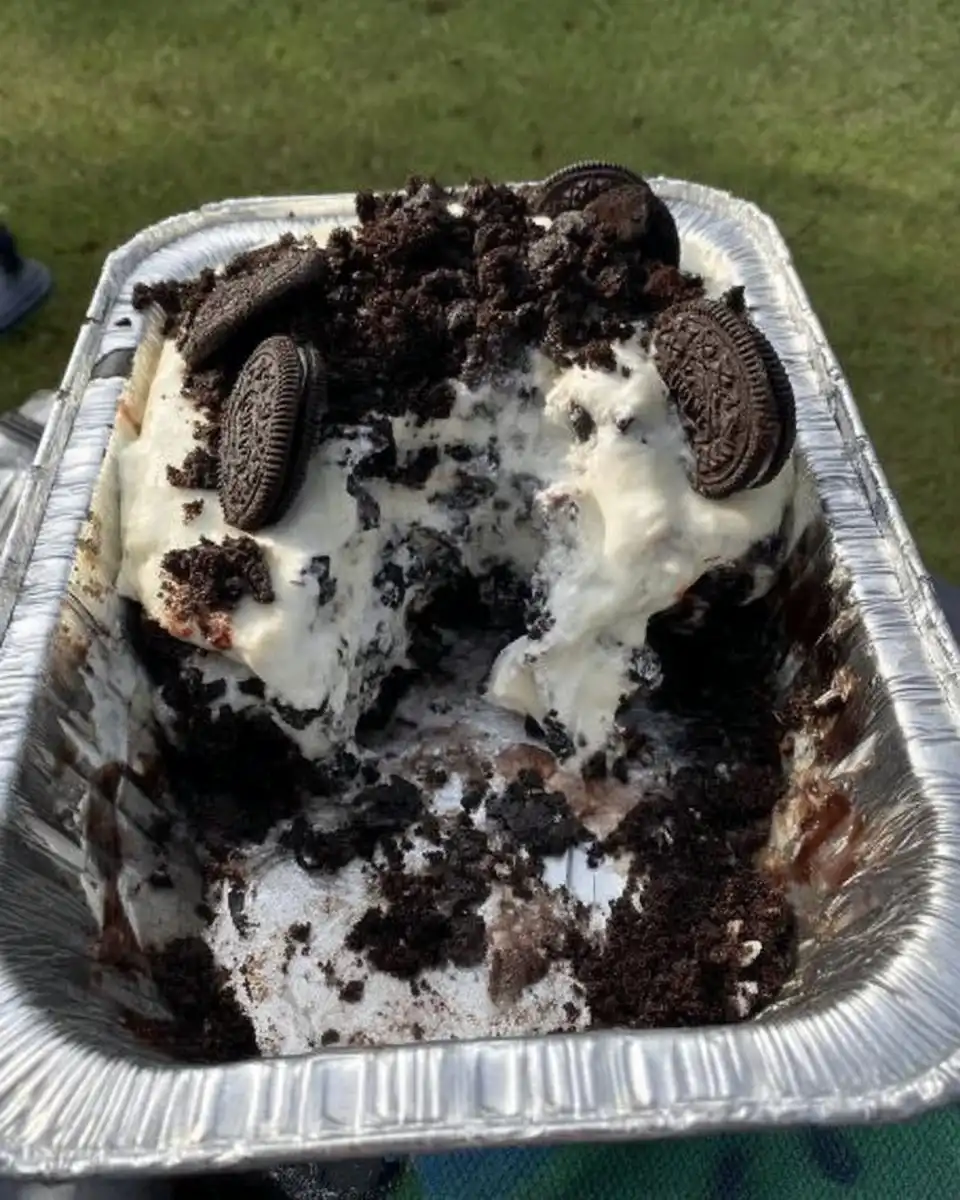 Close up of whipped cream at stiff peaks stage in a metal bowl