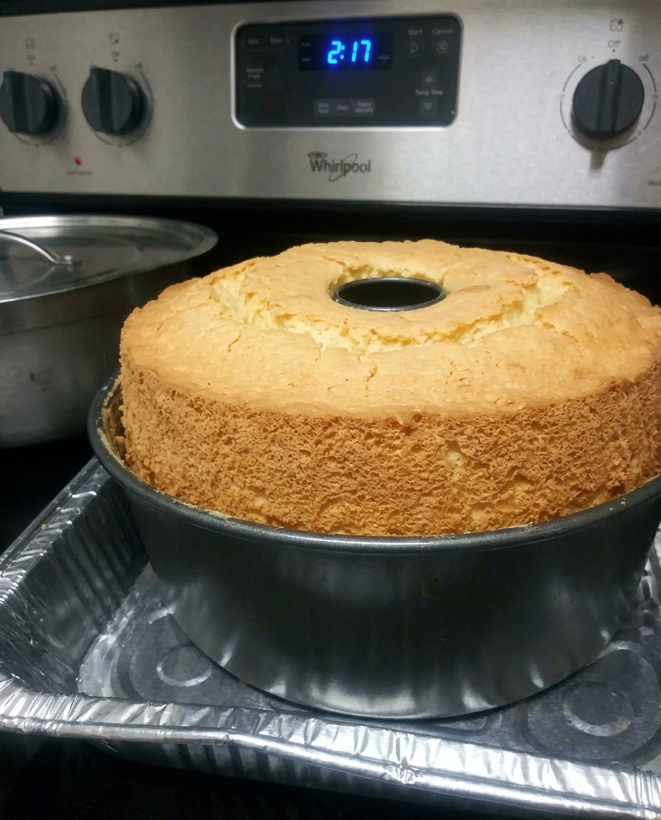 A close-up view of the fine crumb and golden exterior of a 7 Up Cake.