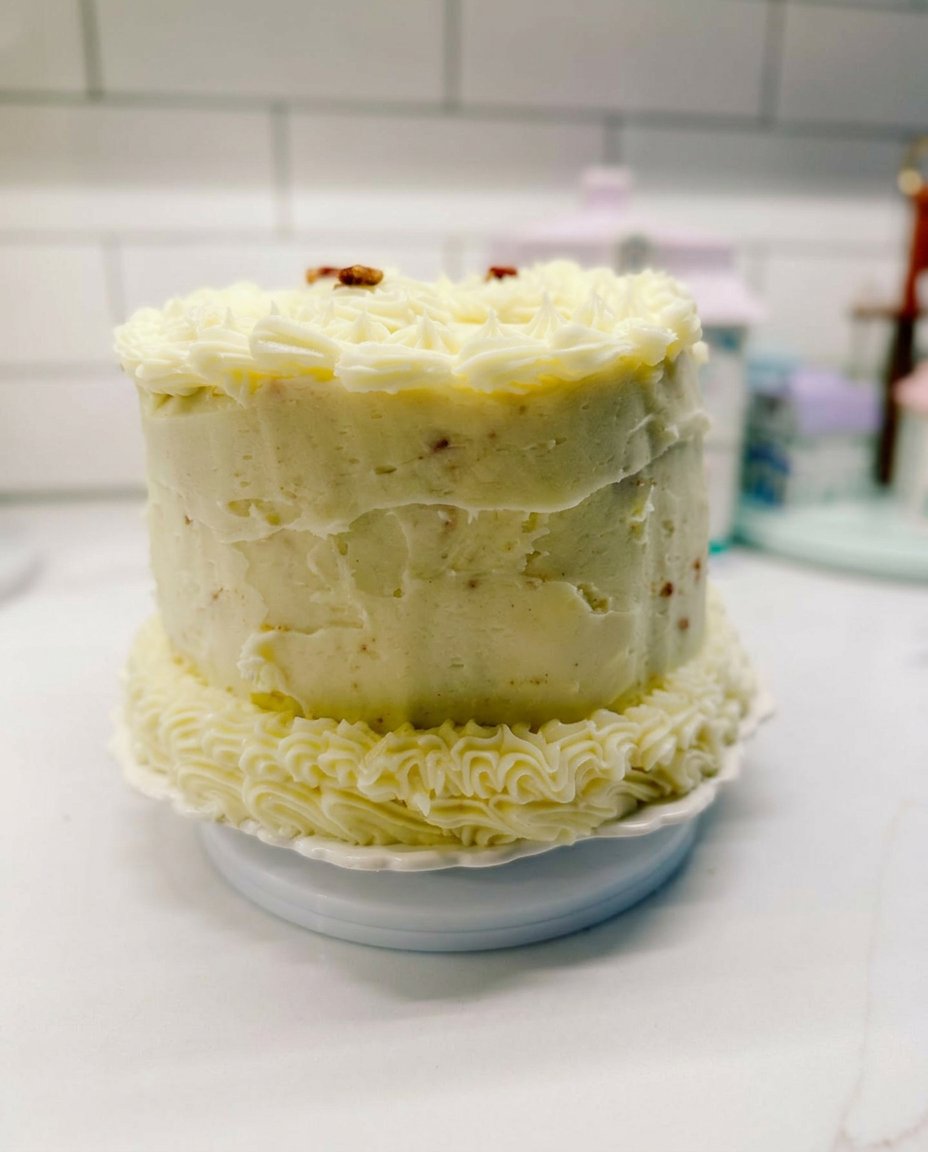 Fake Cake 14 Slices of strawberry Swiss roll topped with gooey ganache on a beautiful cake