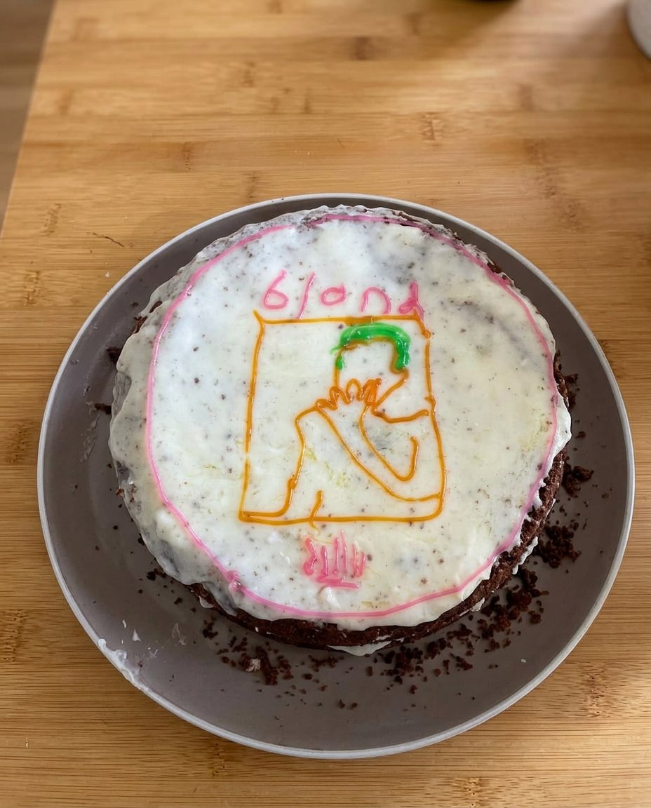 A slice of Frank Ocean Cake showing moist blue and teal layers