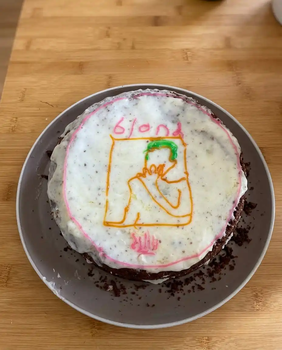 A slice of Frank Ocean Cake showing moist blue and teal layers