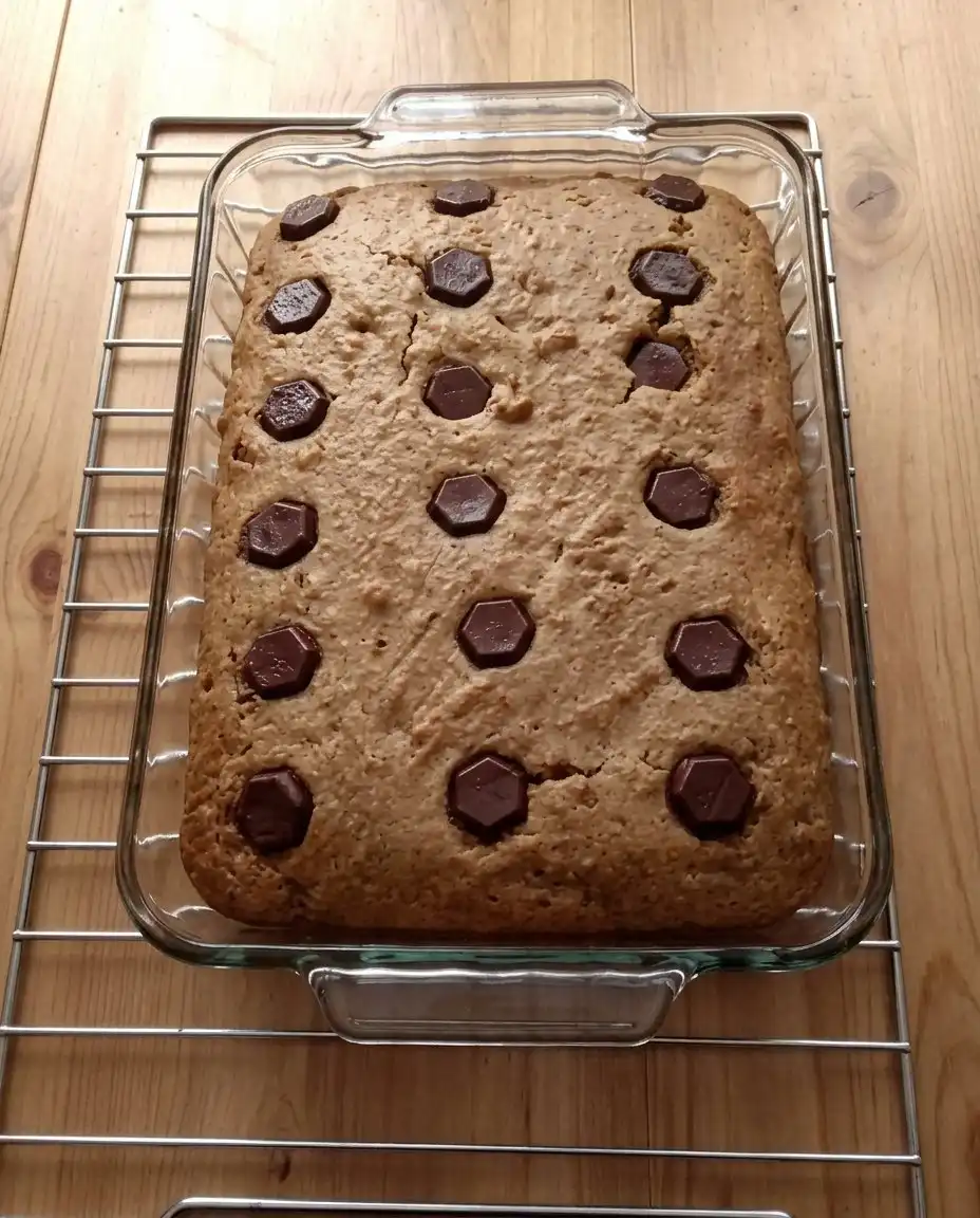 Mashing speckled overripe bananas in a bowl with brown sugar
