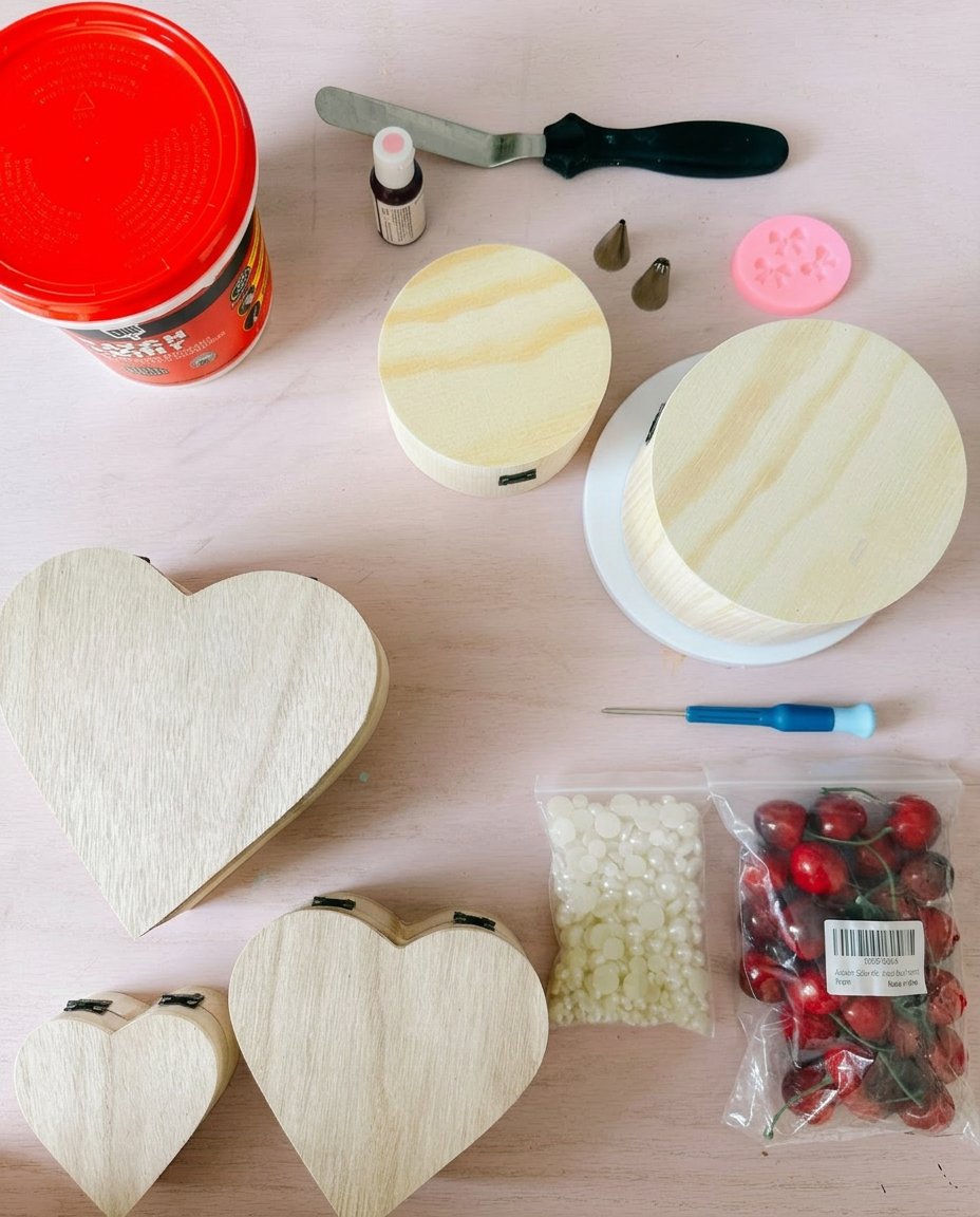 Fake Cake 12 Store-bought ingredients for a quick fake bake cake including strawberry frosting and Swiss rolls