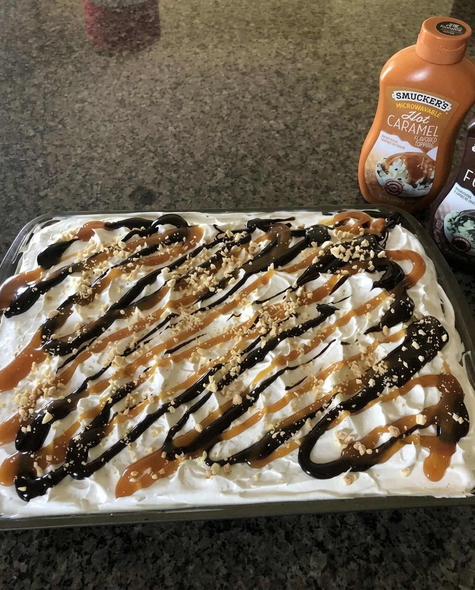 A clean slice of ice cream sandwich cake being served on a plate
