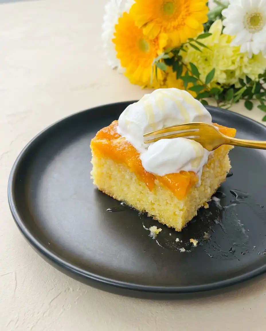 Brown Sugar Peach Upside Down Cake 12 A close up of caramelized peaches in a brown sugar peach upside down cake