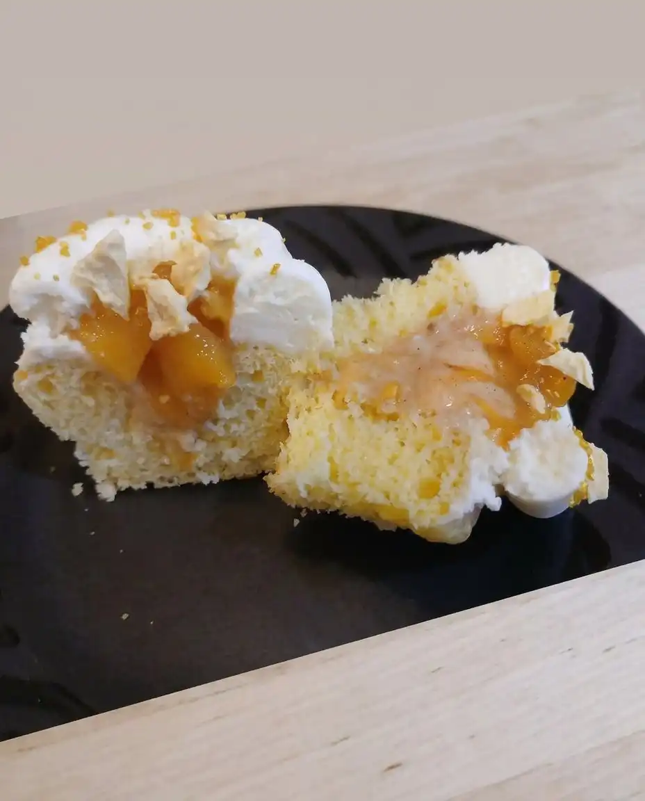 Smooth and glossy honey cheesecake batter in a mixing bowl