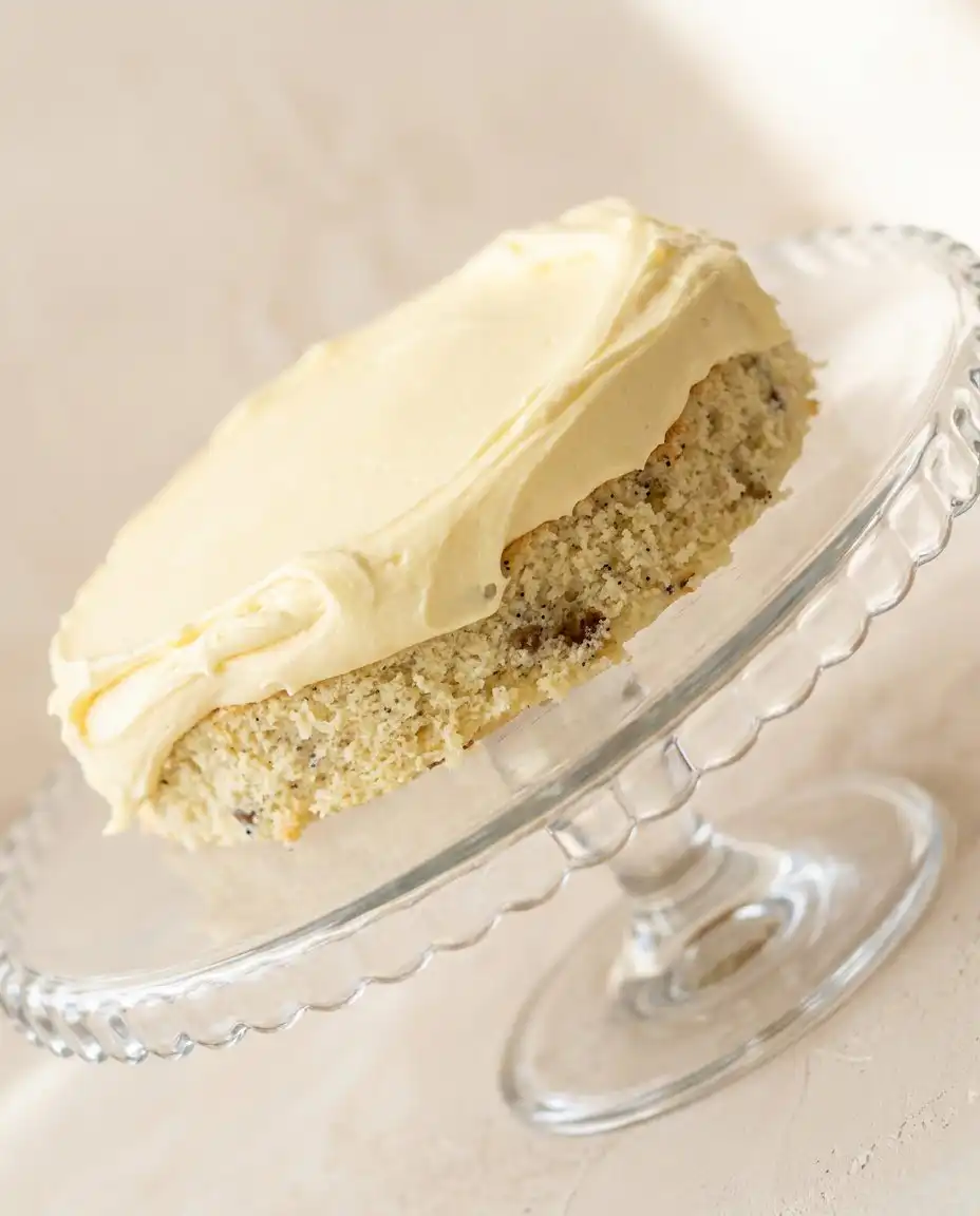 Three-Layer Italian Cream Cake 15 A spatula folding fluffy egg whites into a Three-Layer Italian Cream Cake batter.