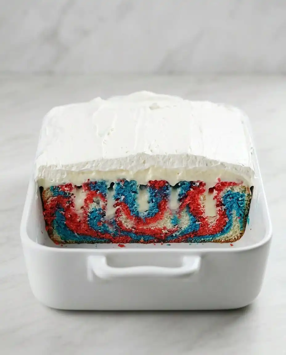 Cake mix, pudding, heavy cream, and food coloring on a table