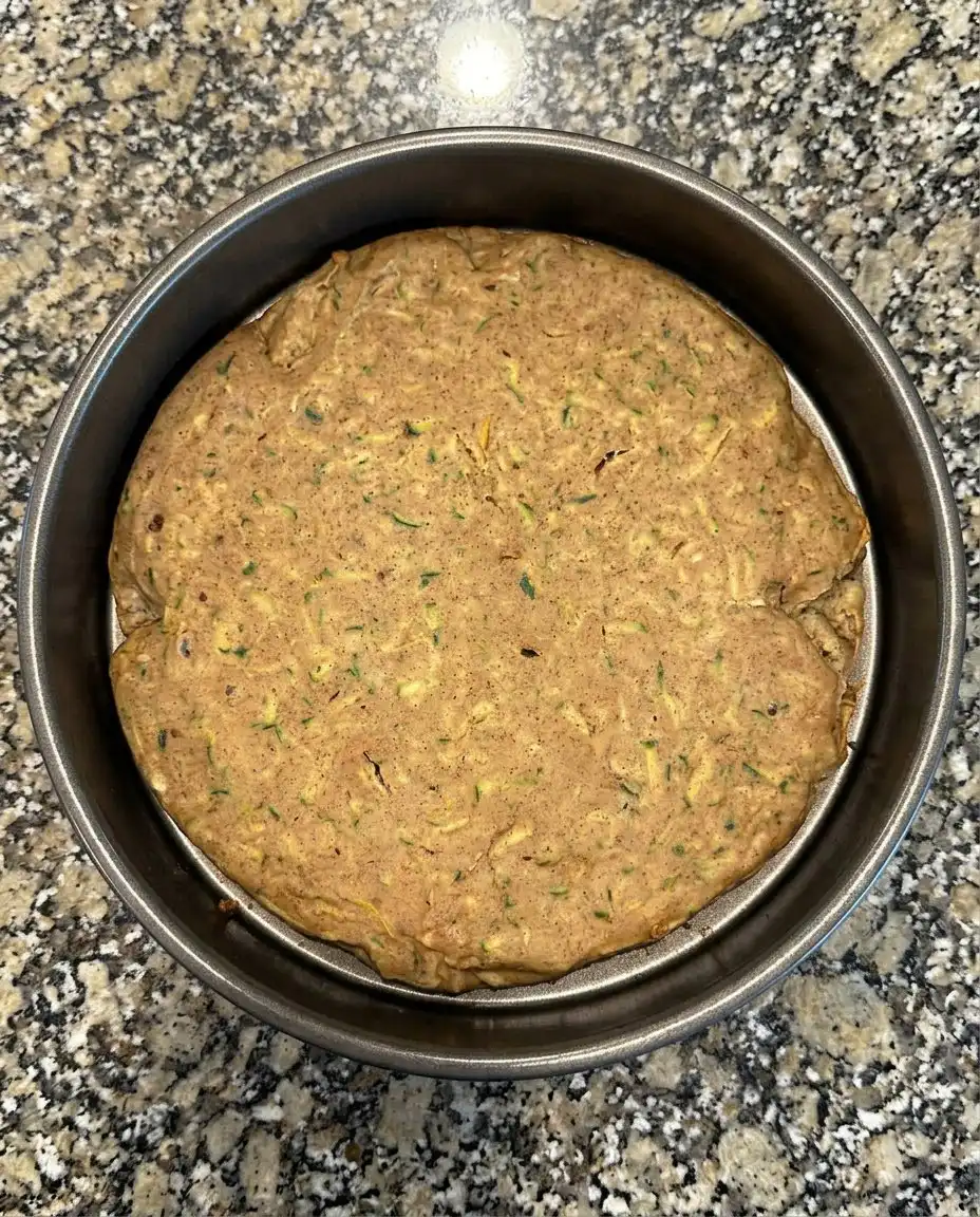 Cream cheese maple frosting being whipped in a bowl