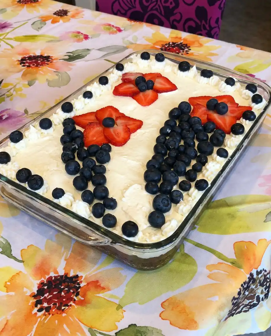 Easy 4th of July Brownies 14 Cleanly sliced 4th of July brownies on a white serving platter