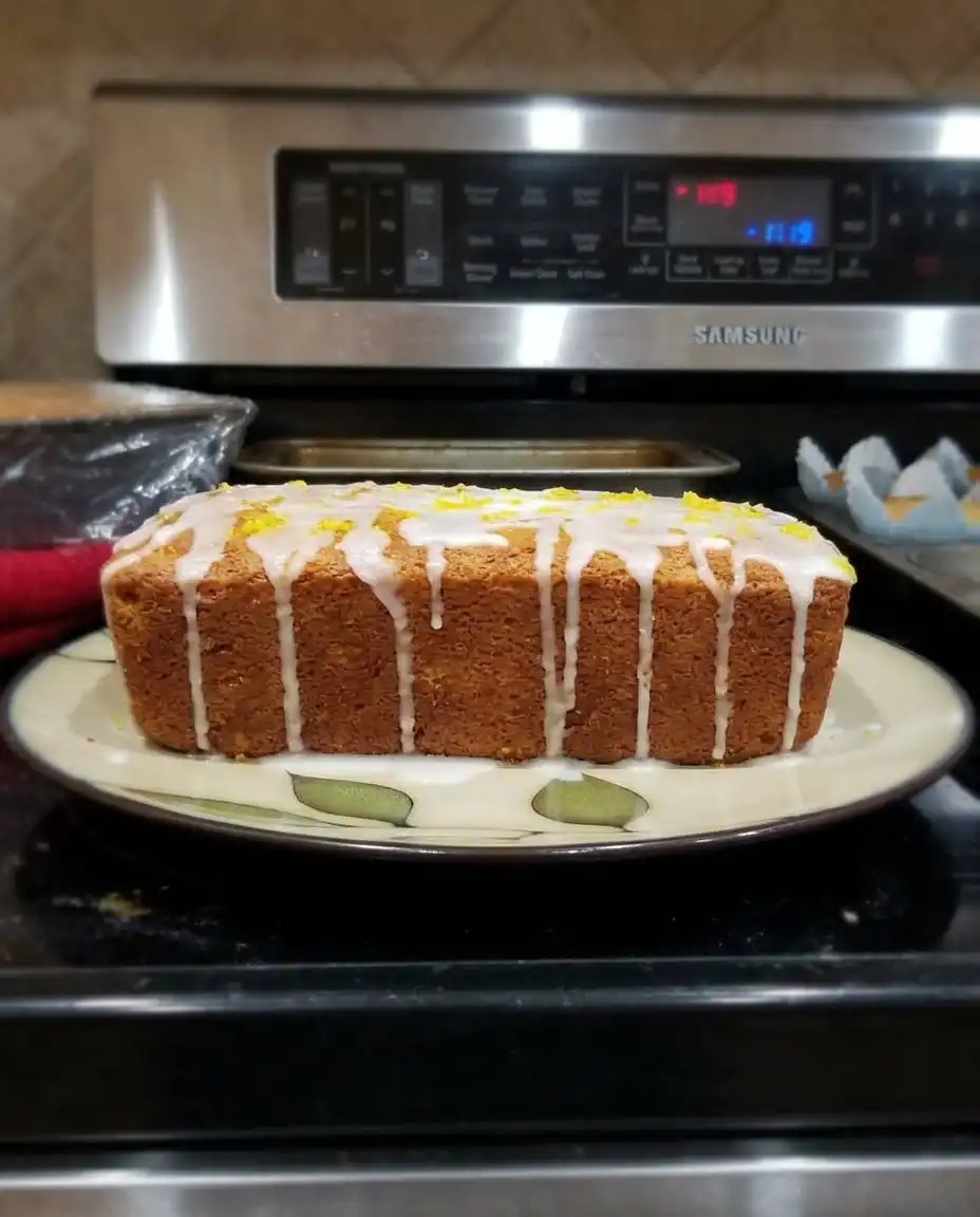 Lemon Zucchini Bread 14 Perfectly sliced lemon zucchini bread with glaze dripping