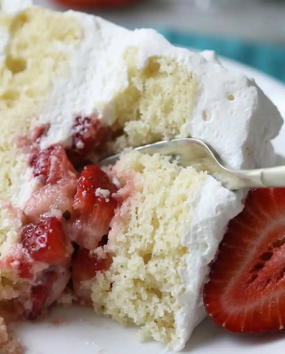 Strawberry Shortcake Cake 10 A three layer Strawberry Shortcake Cake with whipped cream frosting and fresh strawberries.